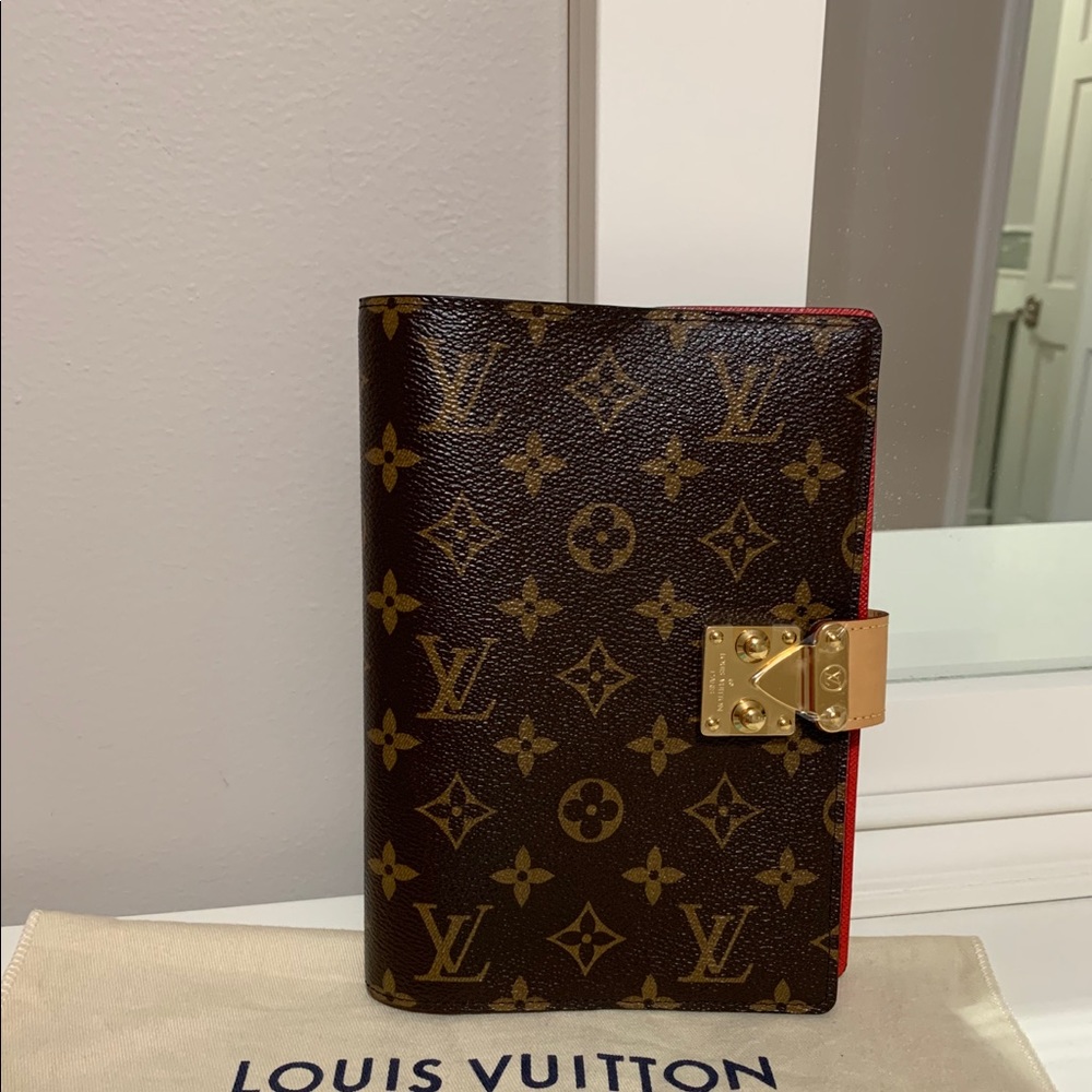Authentic Louis Vuitton Paul notebook.